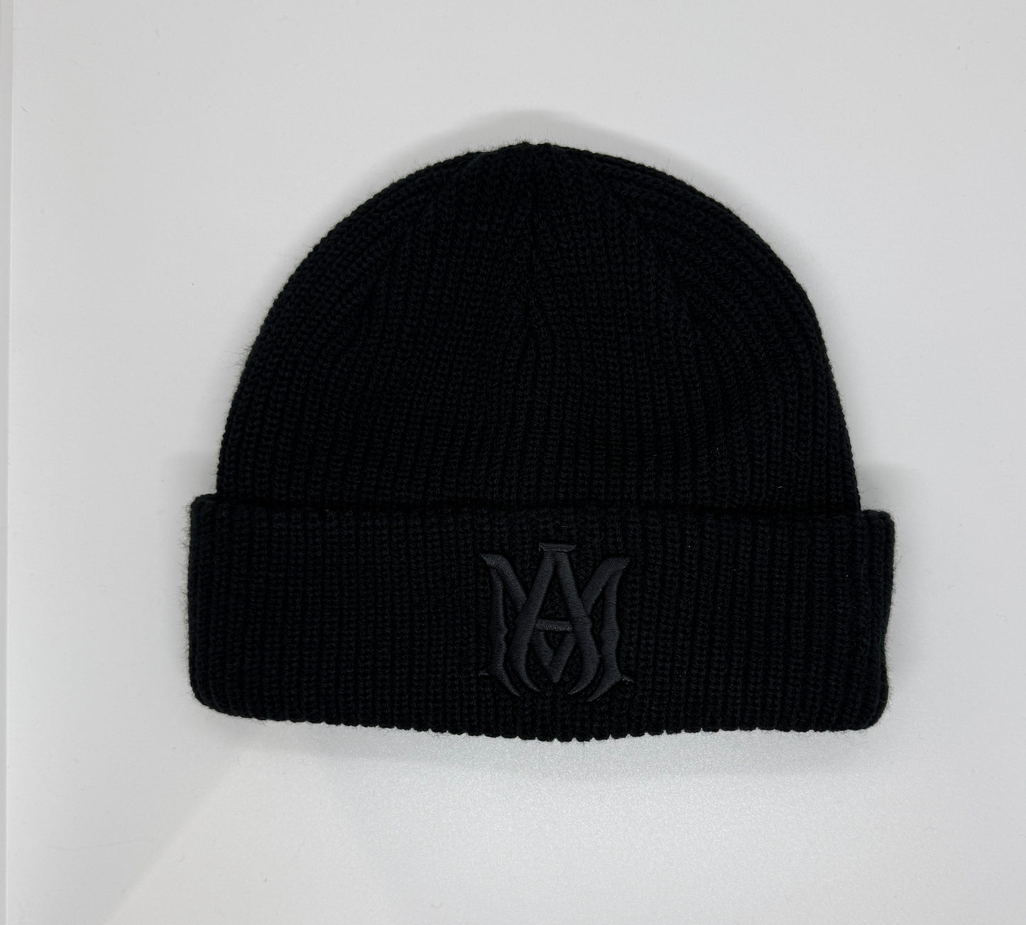 Amiri hat AM logo